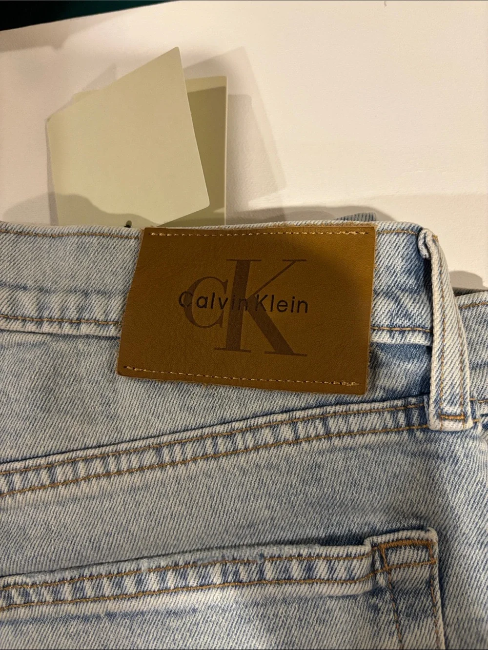 Calvin Klein Light Wash Denim Jeans with Tan Leather Patch - Picture 5 of 10